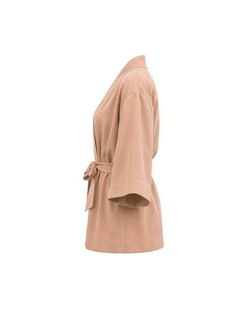 Beige wrap dress on a white background