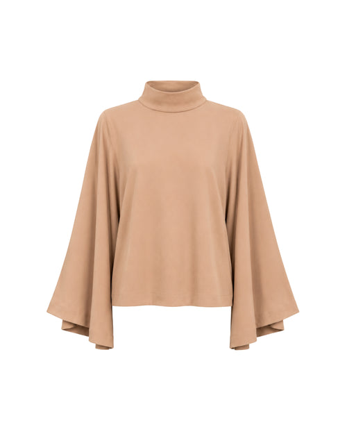Beige turtleneck top on a white background